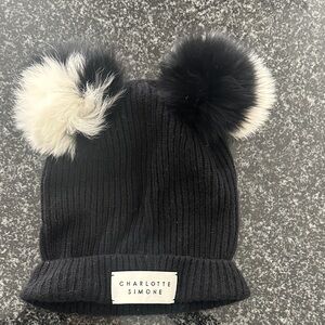 Charlotte Simone 100% cashmere hat with fox fur pompoms. Black and cream.